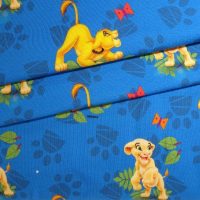 Kids Jerseystoff mittelblau mit Disney Löwen